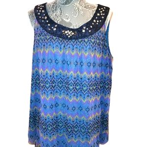 Avenue plus size sleeveless loose fit blouse.